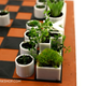 Illustration for article titled Play Chess And Plant Herbs on This Bauhaus-Inspired Game Board